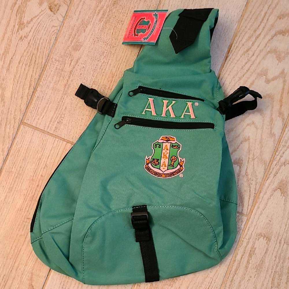 Green AKA Sling Backpack BNWT!